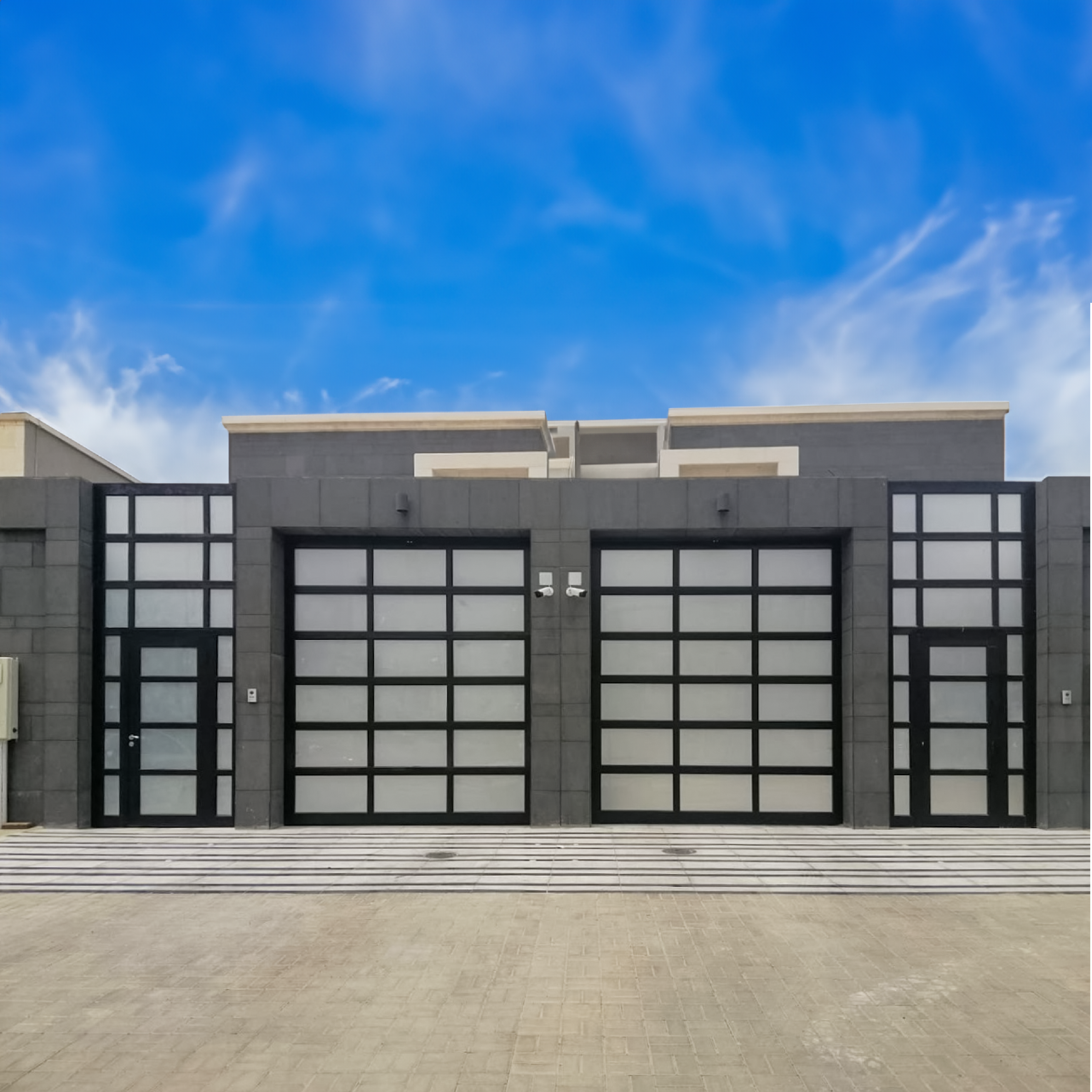 Modern panoramic garage door with sleek design and large glass pane